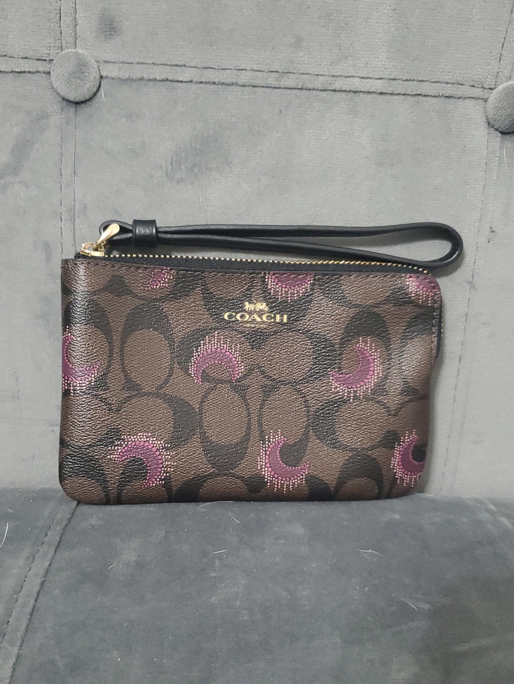 COACH Brown Signature Canvas Wristlet with Pink Accents